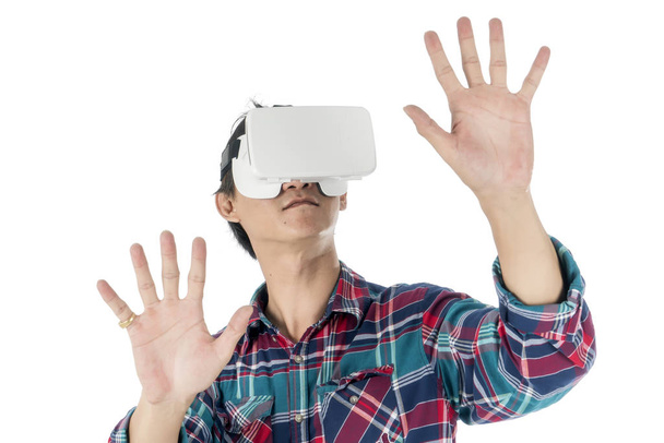 Man using a VR headset and experiencing virtual reality - Foto, immagini