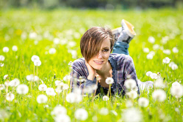 Happy spring woman on green nature - Photo, Image