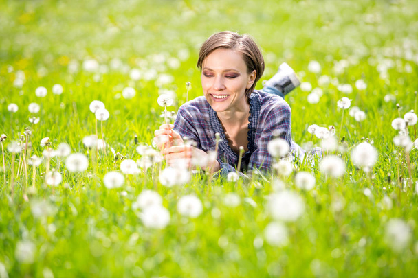 Happy spring woman on green nature - Photo, Image