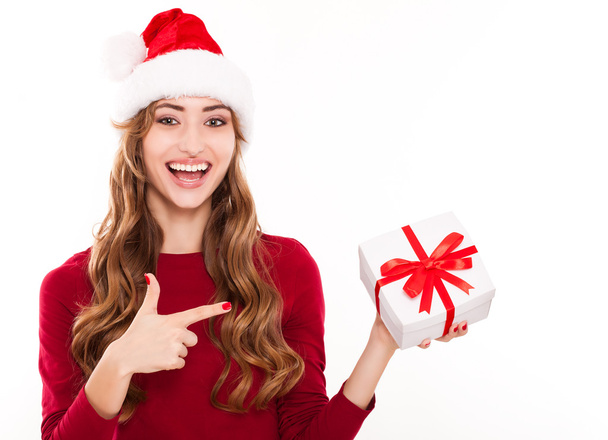 Smiling christmas woman with gift - Foto, Imagen