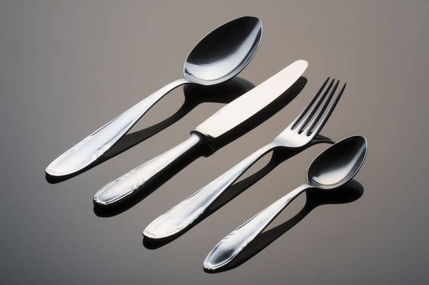 Metal cutlery on black background - Fotoğraf, Görsel