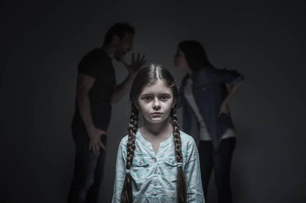 Portrait of scared girl looking at camera - Foto, Bild