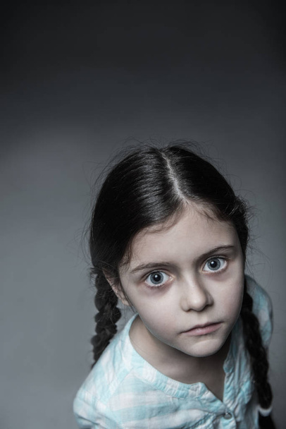Portrait of strange girl looking at camera - Valokuva, kuva