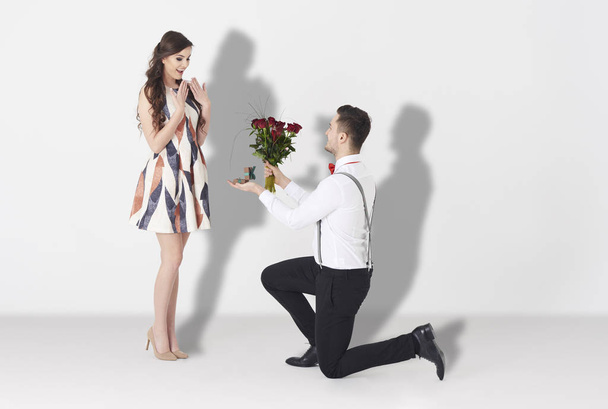 man surprising woman with engagement - Photo, Image