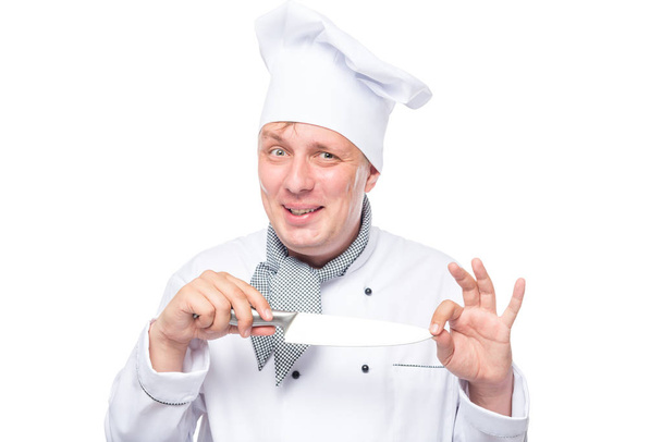 crazy chef with a sharp knife emotional portrait on a white back - Zdjęcie, obraz