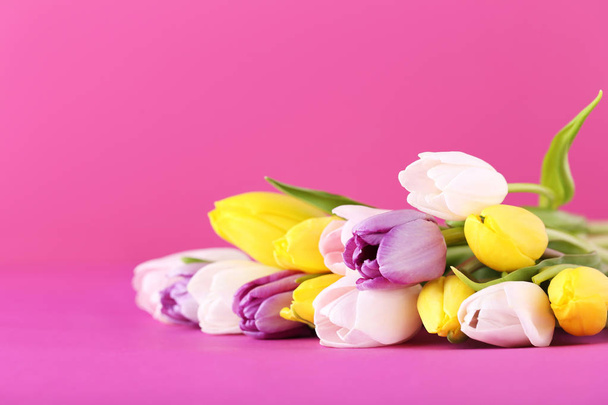 Bouquet of tulips on pink - Photo, Image
