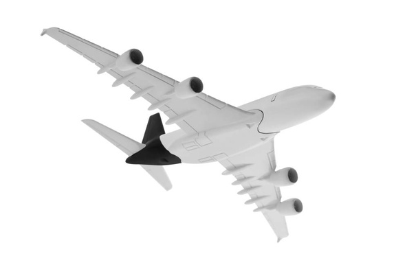 Flugzeug mit schwarzer Farbe, isoliert auf weißem Hintergrund. - Foto, Bild