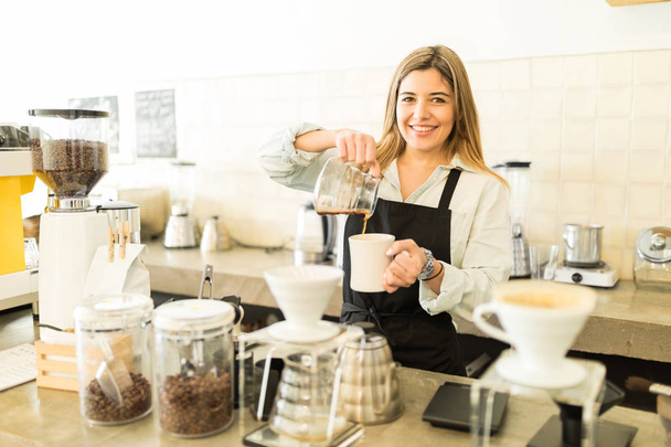 Barista serving coffee - Photo, Image