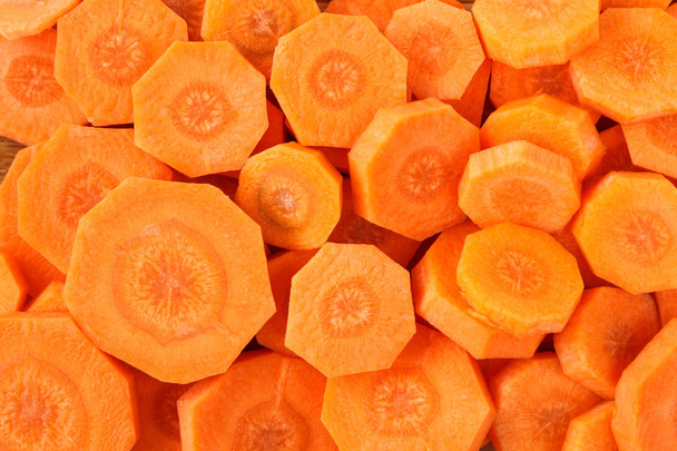 Zanahoria rebanadas fondo
 - Foto, imagen