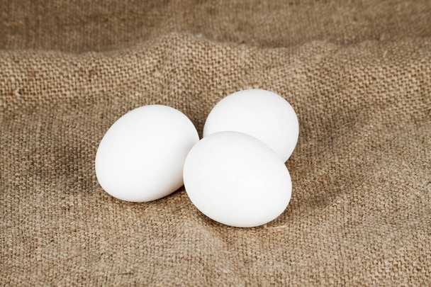 White chicken eggs close up - Foto, imagen