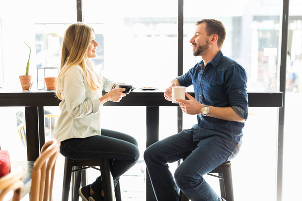 Couple having date and drinking coffee  - Zdjęcie, obraz