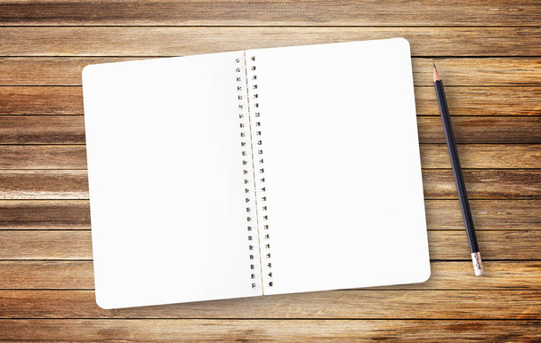 Escritório com notebook sobre fundo de madeira marrom
  - Foto, Imagem