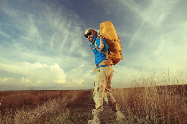 man traveler with a backpack - Фото, зображення