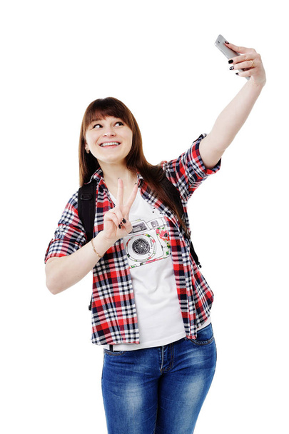 Щаслива усміхнена жінка фотографує селфі на смартфоні
 - Фото, зображення