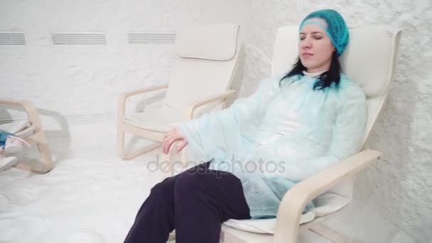 Two women and girl relaxing in a salt cave - Footage, Video