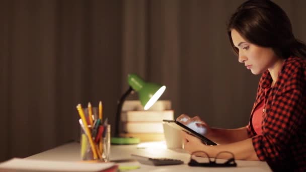 student girl or woman with tablet pc at night home - Filmmaterial, Video