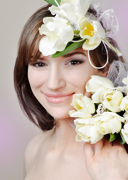 krásná mladá žena s květinou - Fotografie, Obrázek