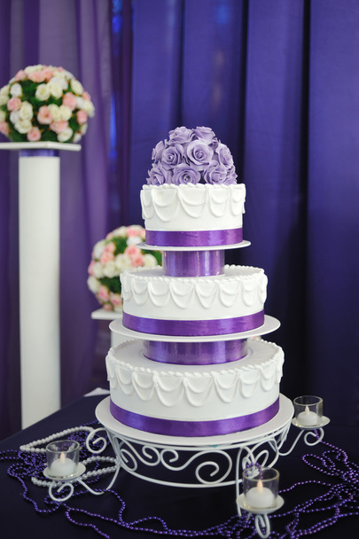 White wedding cake with purple flower detail - Photo, Image
