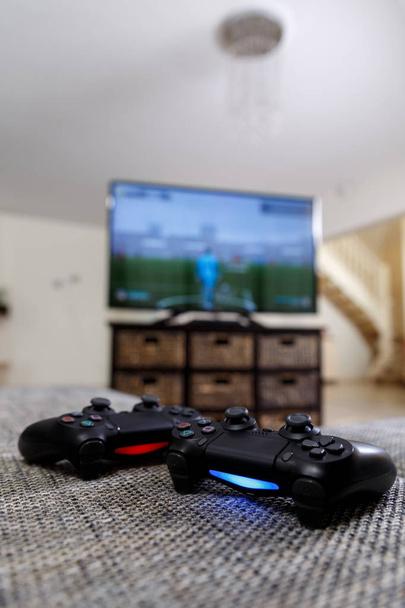 Playing video game. Console controllers. - Fotografie, Obrázek