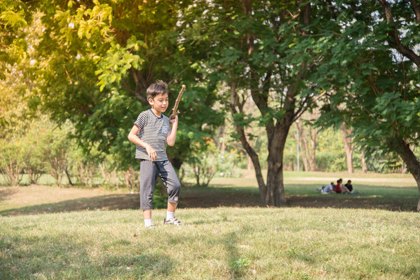 Little boy playing tic tac toe game in the park  - Фото, зображення