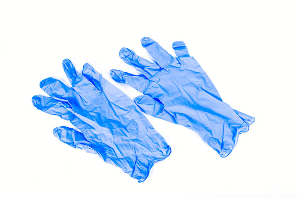 New sterile blue latex gloves isolated on a white background. - Photo, Image