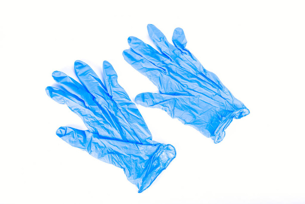 Par de guantes de látex azul
 - Foto, Imagen