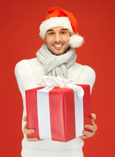 Handsome man in christmas hat - Photo, Image
