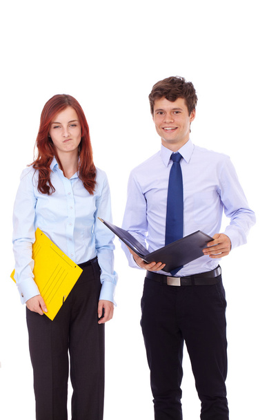 jonge succesvolle vrouw en man in blauwe shirts, geïsoleerd op wit - Foto, afbeelding