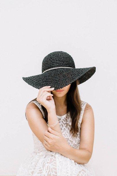 Young woman in hat - Valokuva, kuva