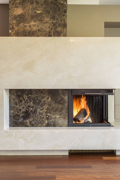 Modern fireplace in luxury interior - Fotoğraf, Görsel