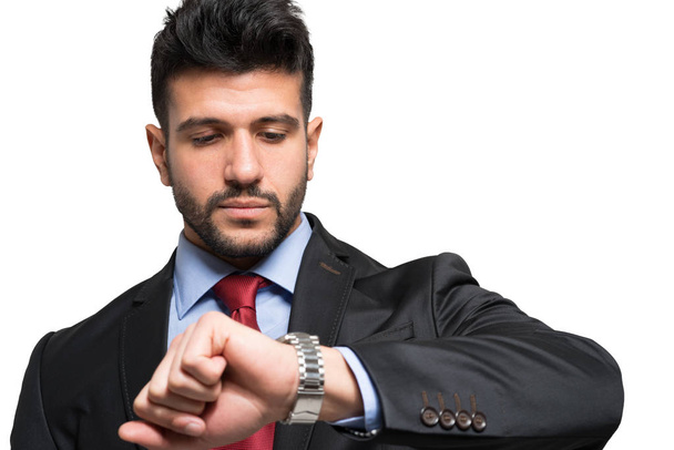 businessman looking at watch - Φωτογραφία, εικόνα
