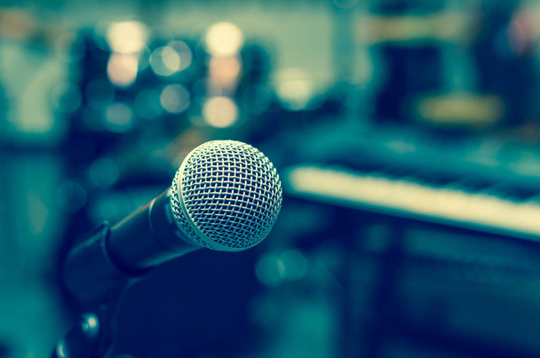 Close up of microphone on musician  background - Photo, Image