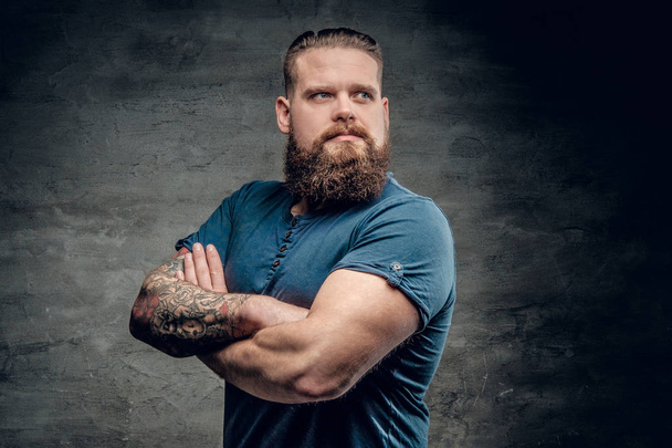 Bearded fat male with tattoos on arm - Photo, Image