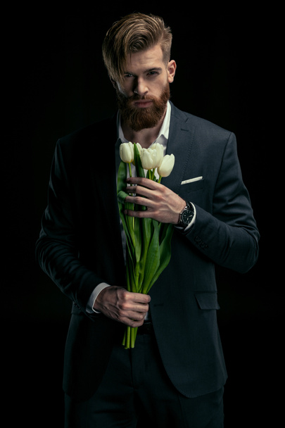 stylish man with tulips - Foto, Imagen