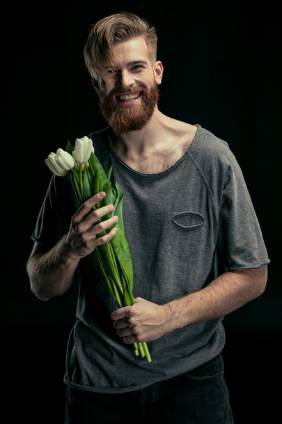 uomo elegante con tulipani
 - Foto, immagini