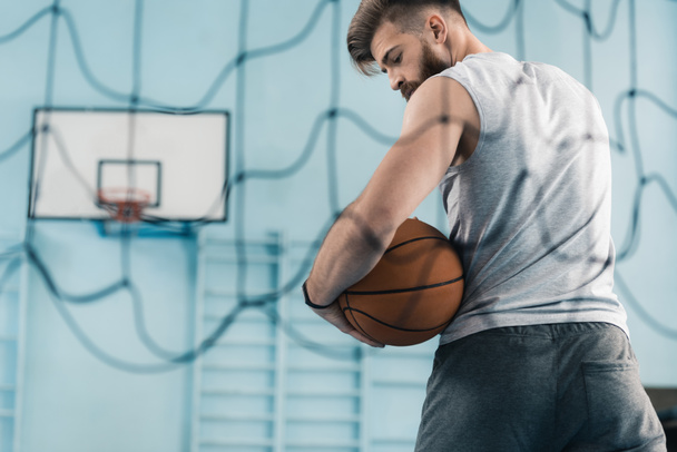 Basketball player with ball - Фото, изображение