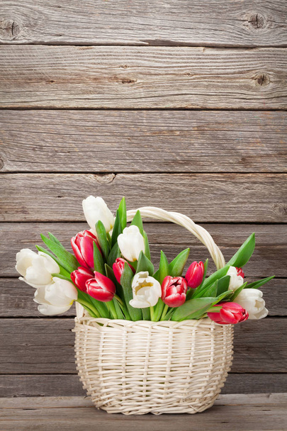 Colorful tulips bouquet basket - Фото, зображення