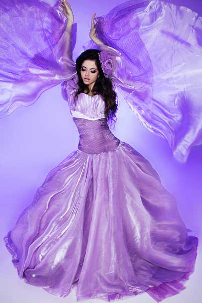 Fairy. Beautiful Girl in Blowing Dress. Fashion Art photo - Fotó, kép