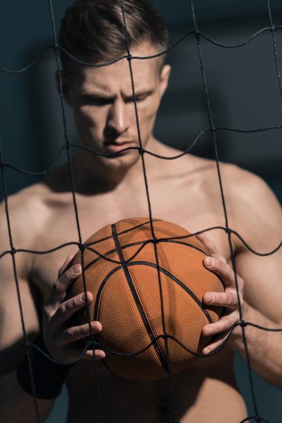 sporty man with basketball ball - Фото, изображение