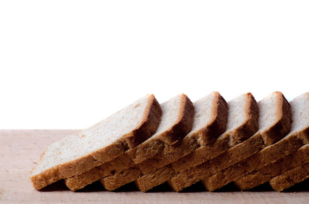 sliced bread on a board - Valokuva, kuva