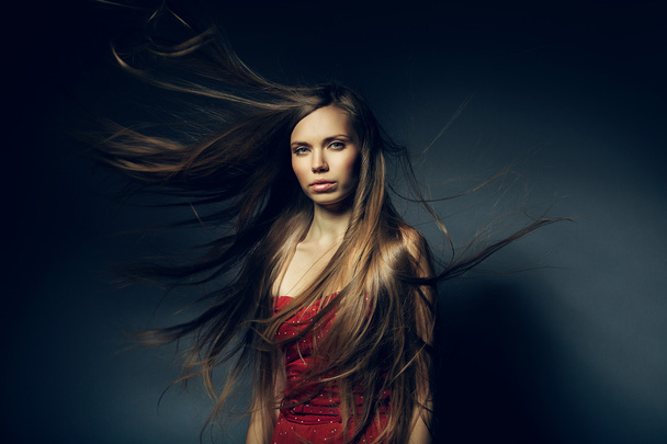 pretty woman with long windy hair - Foto, Bild