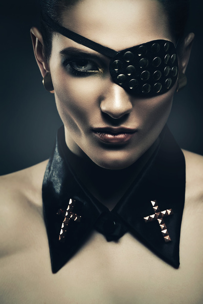 sexy woman with eye-patch and collar - Fotoğraf, Görsel