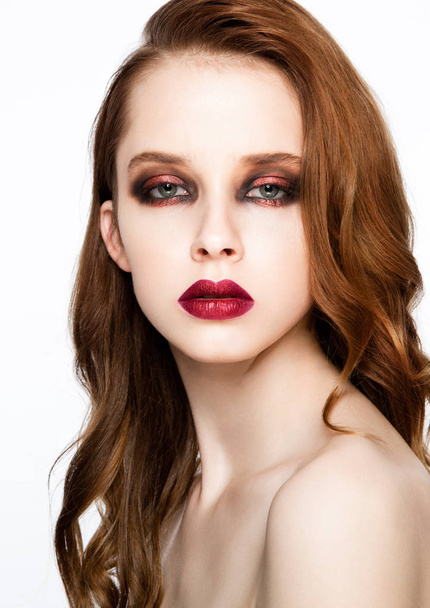 Beauty fashion model ginger hair and red makeup - Foto, imagen