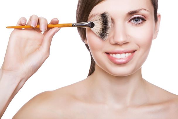 cute woman with brush on eye - Photo, Image