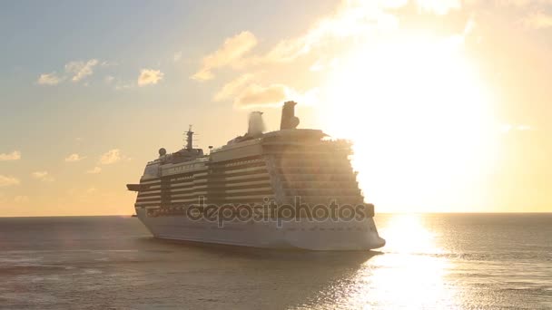 cruise ship sailing the ocean as the sun sets - Footage, Video