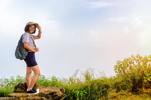 Tourist teen girl poses on mountain - Photo, Image
