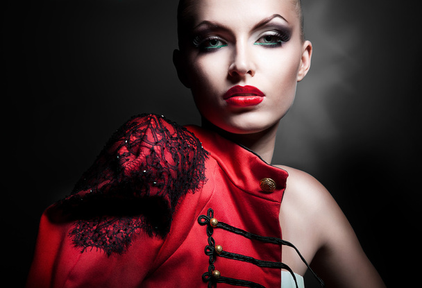 gorgeous sexy woman in red jacket with red lips - 写真・画像