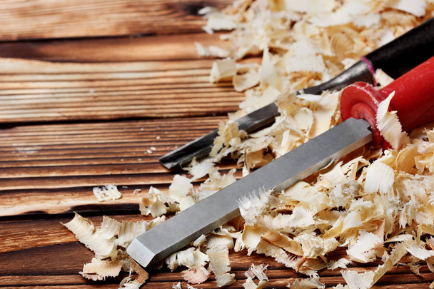 Woodworking tools. Chisel with sawdust .copy space.horizontal shot - Фото, зображення