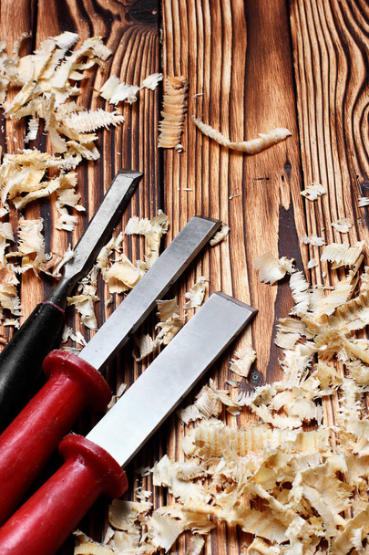 Woodworking tools. Chisel with sawdust .copy space.vertical shot - Fotoğraf, Görsel