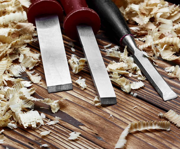 Woodworking tools. Chisel with sawdust .copy space.horizontal shot - Fotoğraf, Görsel